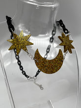 Load image into Gallery viewer, All That Glitters Black and Gold Moon and Star Fluff Earrings and Necklace
